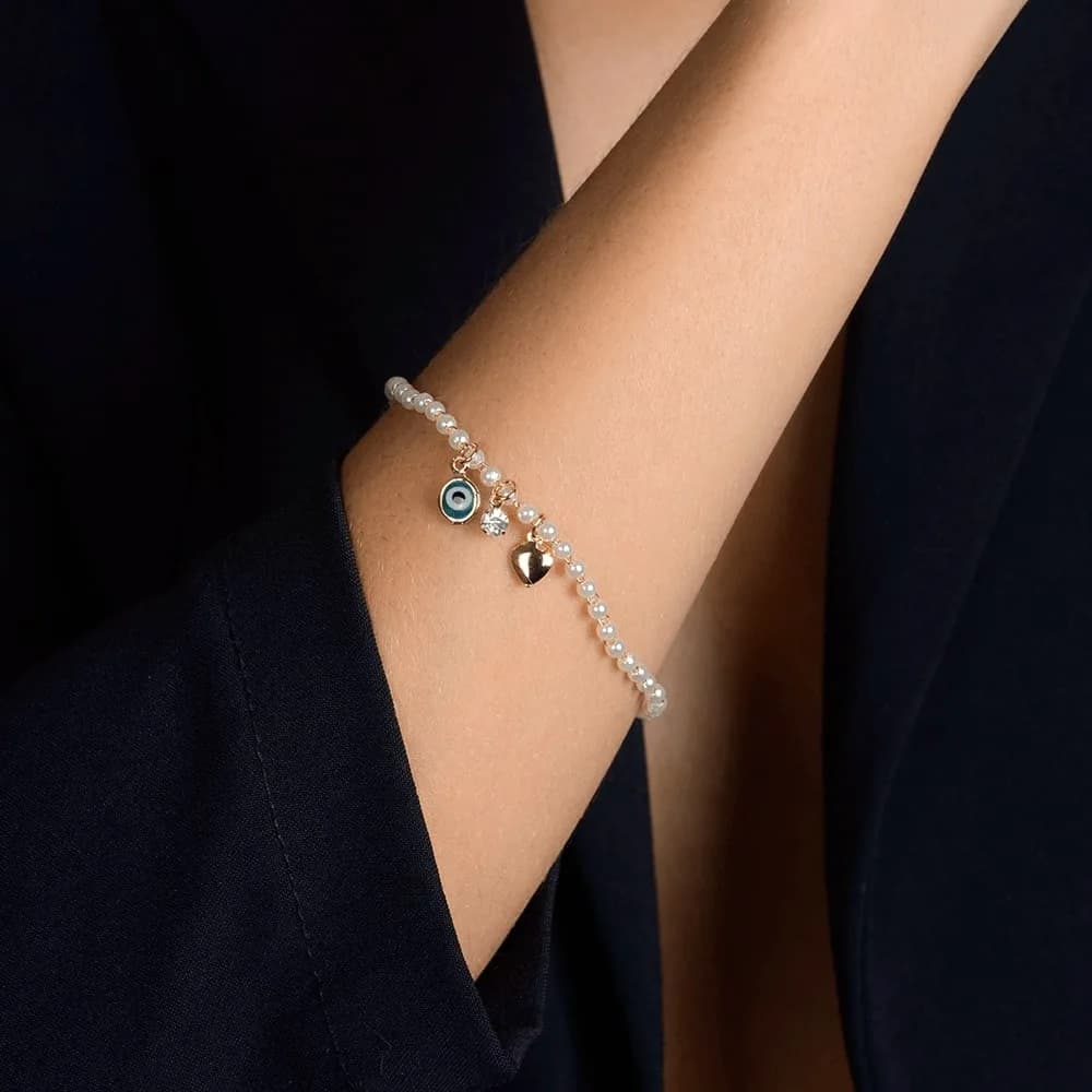Pulseira Dourada de Pérolas com Olho Grego Coração e Ponto de Luz · Banhado a Ouro 18k