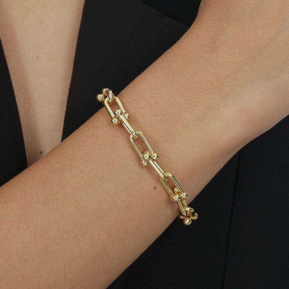 Pulseira Dourada Corrente Elos Largos · Banhado a Ouro 18k