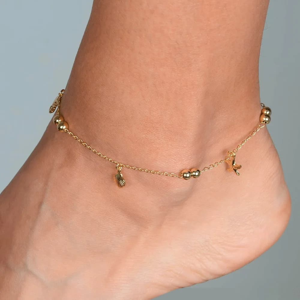 Tornozeleira Dourada Fundo do Mar e Bolas · Banhado a Ouro 18k